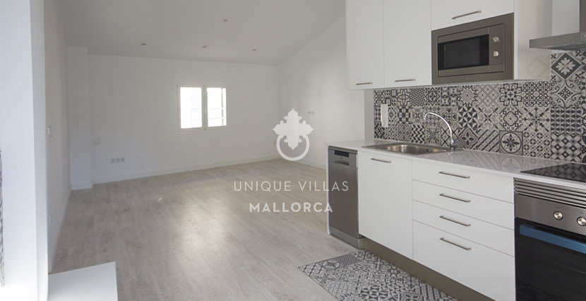uniquevillasmallorca reformed flat for sale in Palma center kitchen:living area